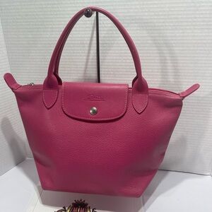 Longchamp Pink Leather Hand bag in small size.Preloved